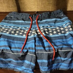 Ocean Current Blue and Red Board Shorts with Star Design